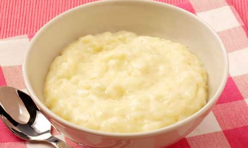 A bowl of clotted cream rice pudding