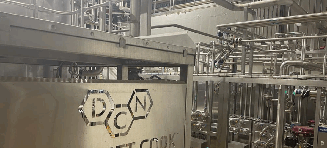 A DC Norris Jet Cook machine in a warehouse.