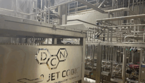 A DC Norris Jet Cook machine in a warehouse.