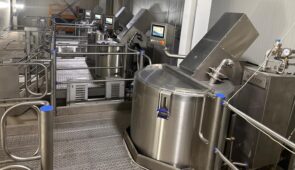 A ready meal food production process equipment being used at a food factory.