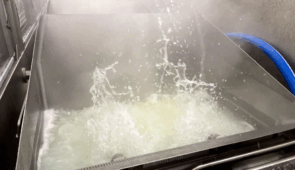 Food manufacturing systems for grain processing being used in food production facility.