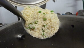 Vacuum cooling machine being used to made to make egg fried rice after vacuum cooling process