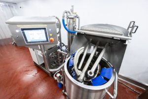 Industrial cooking systems with automated controls in a commercial food manufacturing facility.